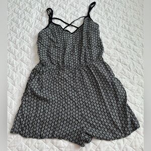 Divided H&M Romper Size 8  Black Patterned 
With Pockets Pre-owned